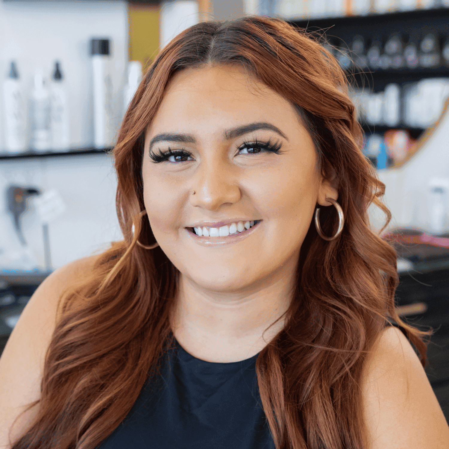 Portrait of Alexa, a professional stylist at Salon Blissful Med Spa, showcasing their expertise and style.