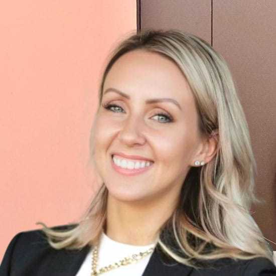 Portrait of Jenni, a professional stylist at Salon Blissful Med Spa, showcasing their expertise and style.