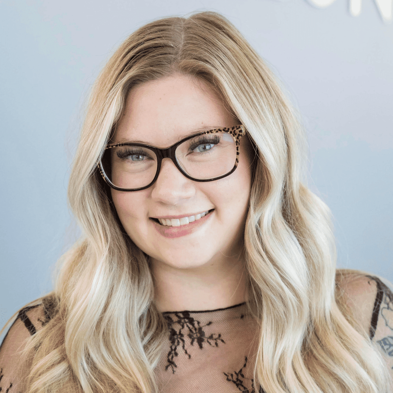 Portrait of Emily, a professional stylist at Salon Blissful Med Spa, showcasing their expertise and style.