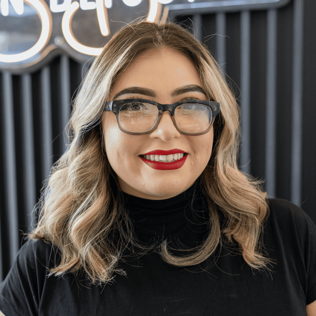 Portrait of Stacy, a professional stylist at Salon Blissful Med Spa, showcasing their expertise and style.