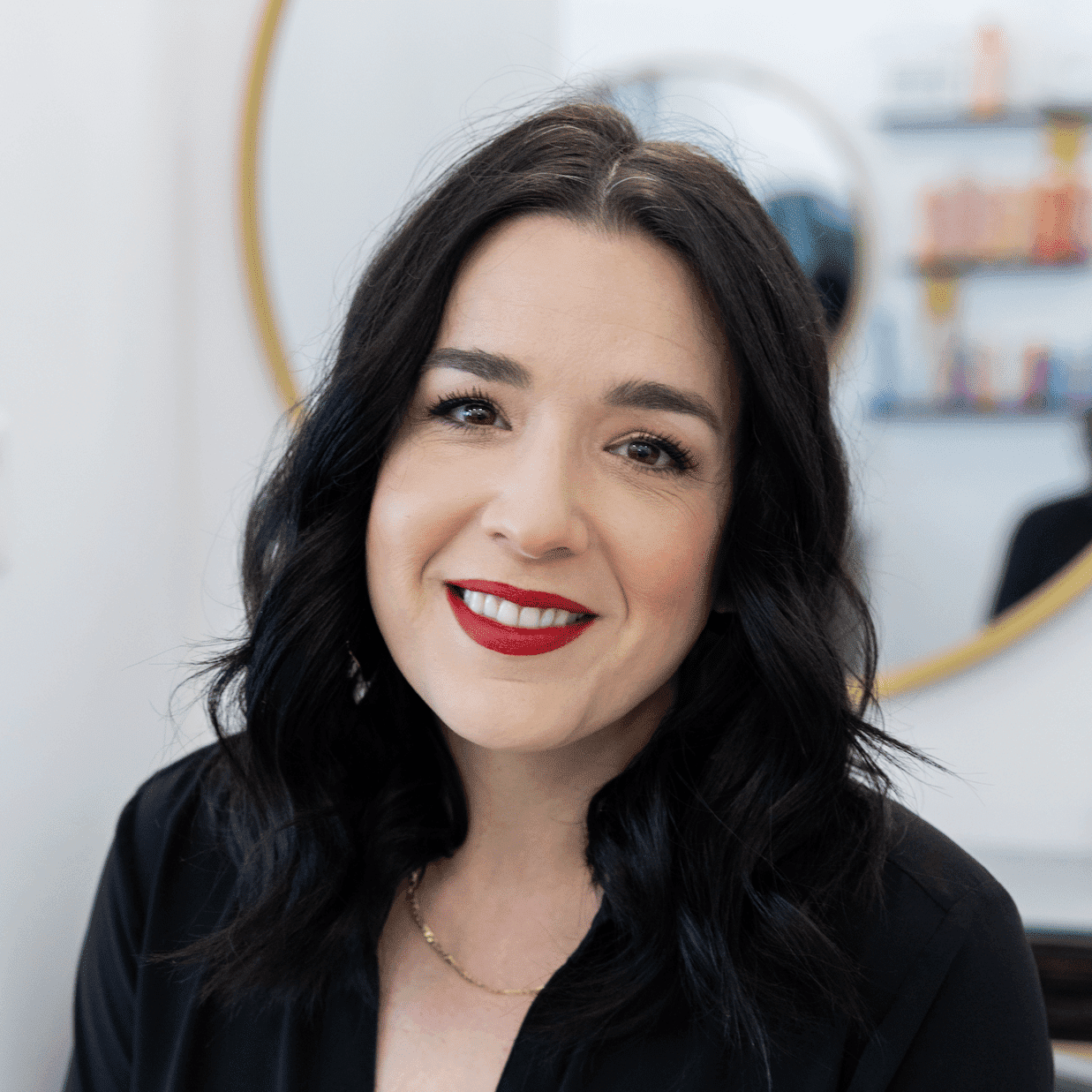 Portrait of Janna, a professional stylist at Salon Blissful Med Spa, showcasing their expertise and style.